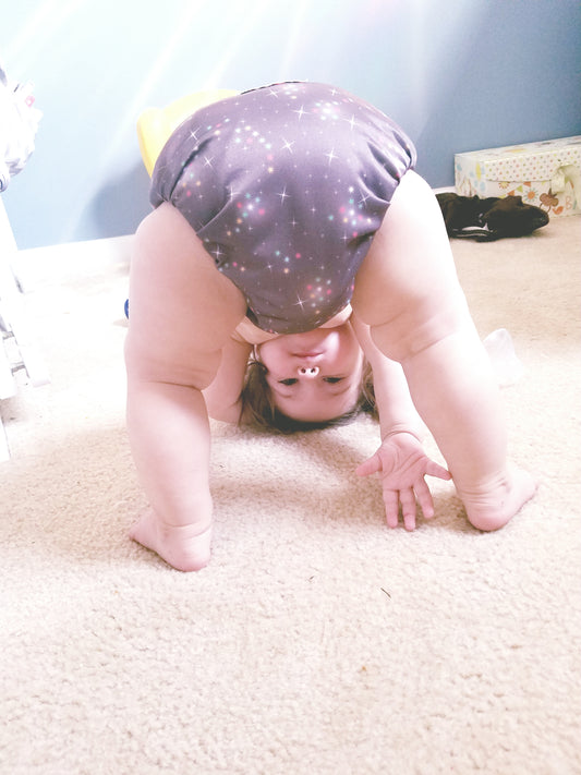 Smart Bottoms cloth diapers feature 100% organic cotton, fashionable prints, and made in the USA highest quality craftsmanship
