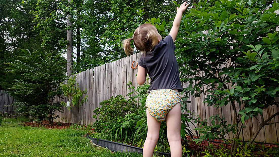 Smart Bottoms' cloth diapers feature 100% organic cotton, fashionable prints, and made in the USA craftsmanship